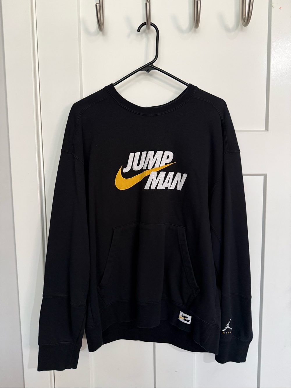 Jordan Black Crewneck Sweatshirt with Gold Swoosh and White Text